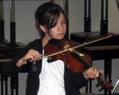 student playing a violin